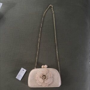 Chic Beige Clutch with Floral Detail